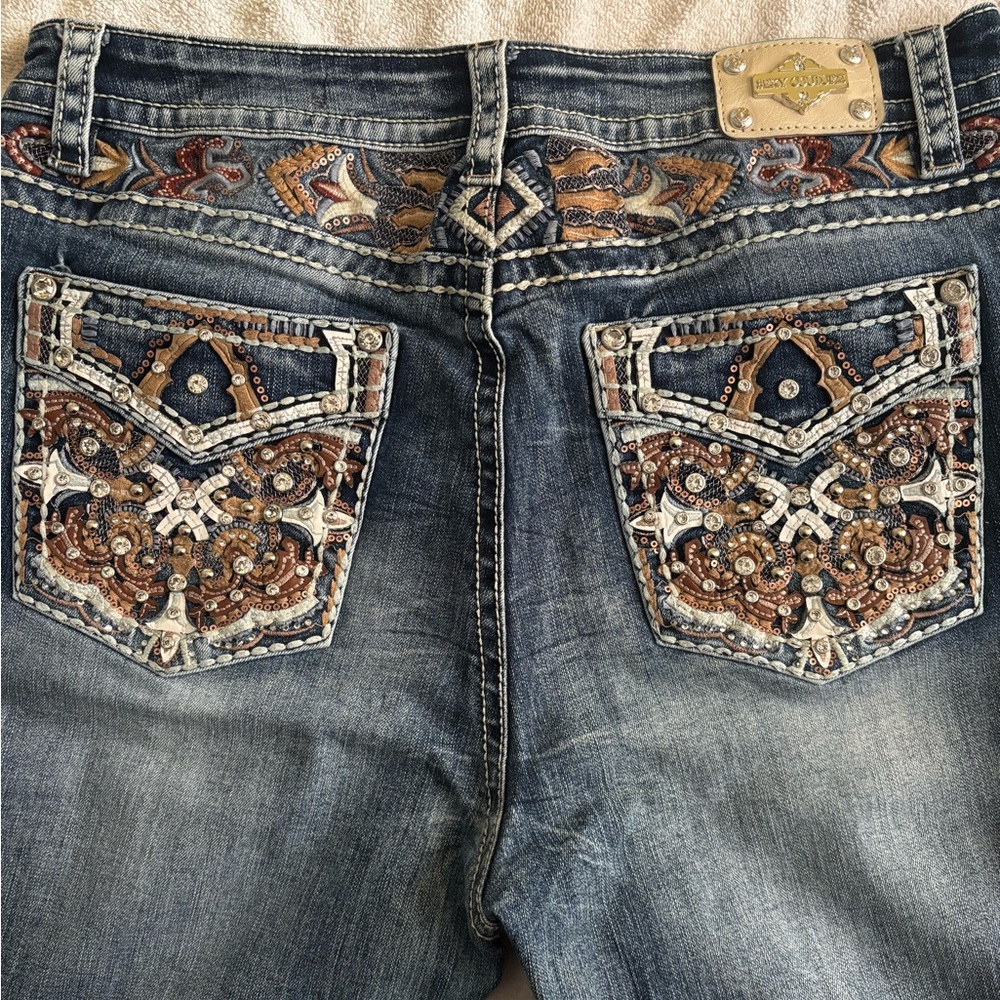 Sparkling Blue Boot Cut Jeans with Intricate Embroidery